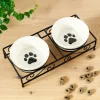 Set 2 Boluri din ceramica pentru caini si pisici Navaris cu suport metalic, 320 ml, 46947.1